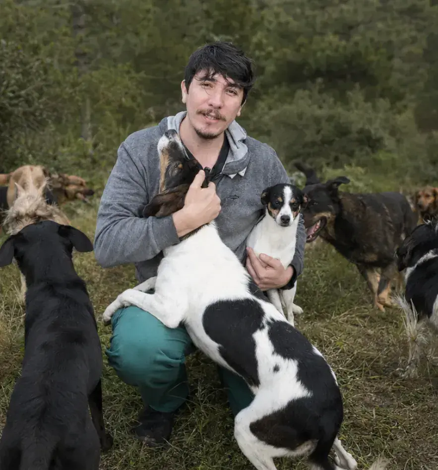 Kyle Rescuer holding a rescued dog
