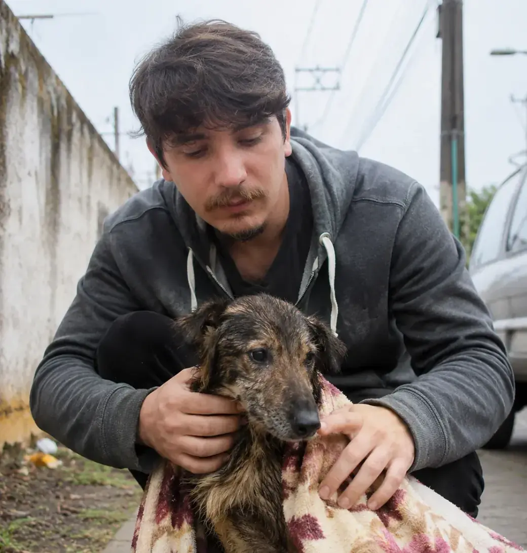 Kyle among the animals he cares for every day